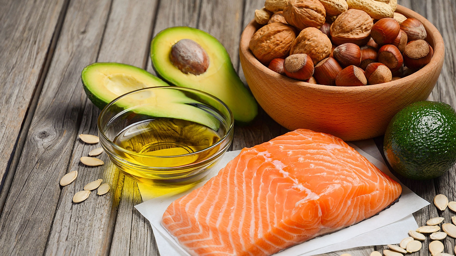 Foods with healthy fats such as salmon, olive oil, avocados, nuts and seeds